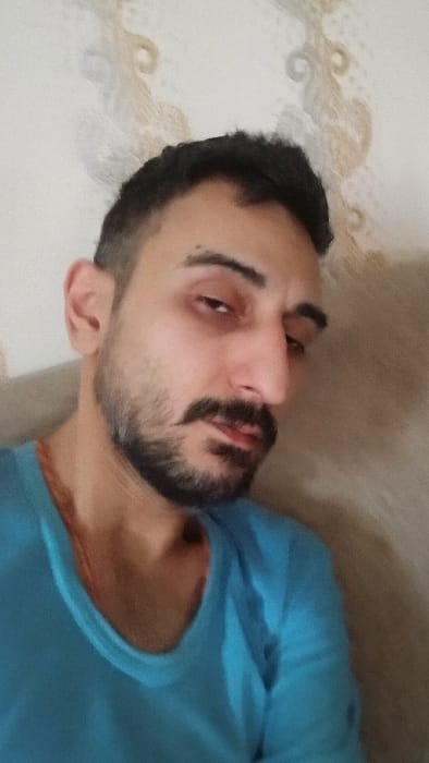 Man photographed lying down in Parand, Iran