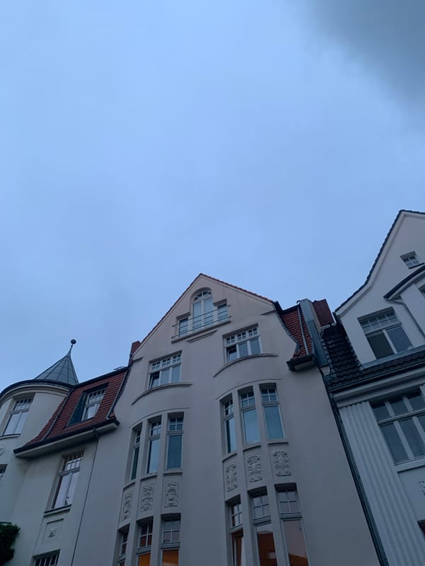 Urban architecture and streetscape documented during overcast evening
