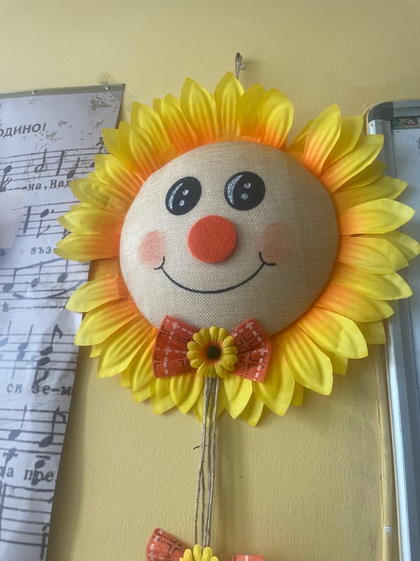Cheerful decorations and blooming plants brighten Bulgarian village morning