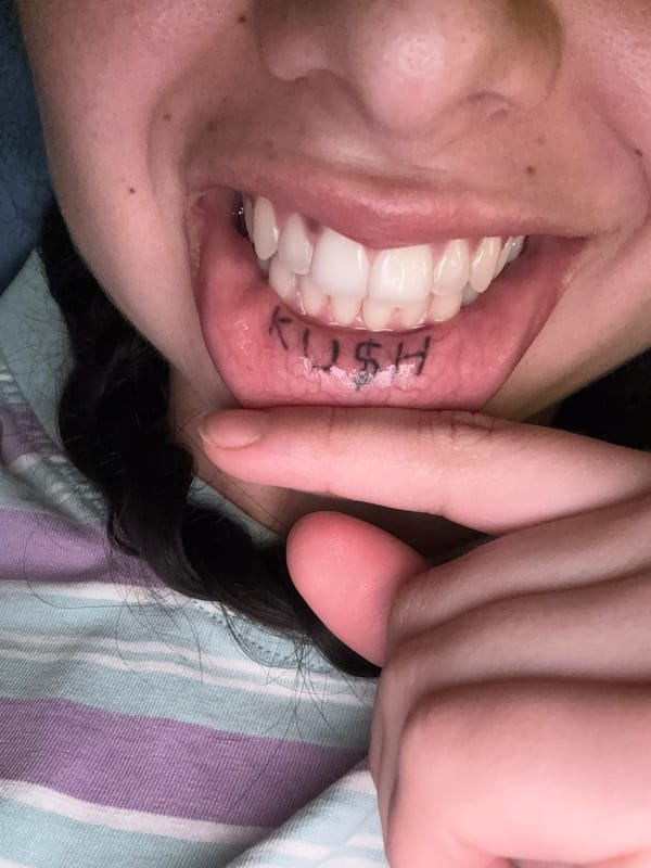 Person conducts mouth self-examination in Como, Australia