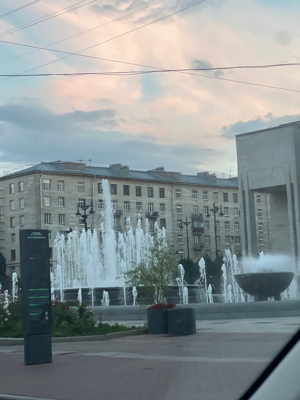 Fountain in front of a gray apartment block, Saint Petersburg