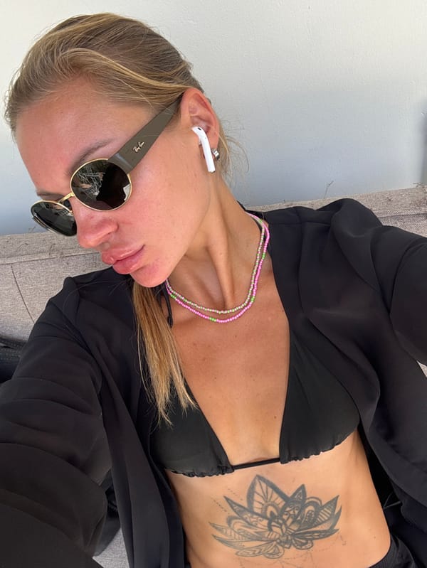 Woman records selfie content in Choeng Thale, Thailand