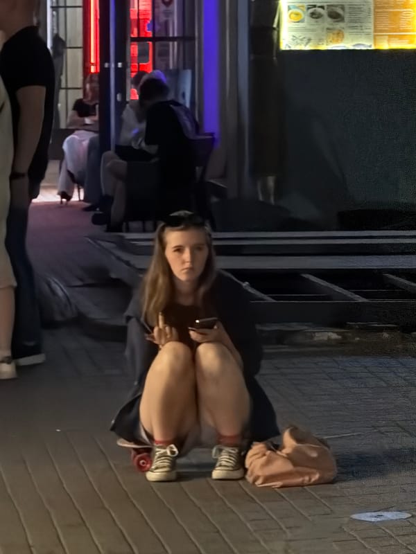 Evening street life captured in Moscow neighborhood scenes