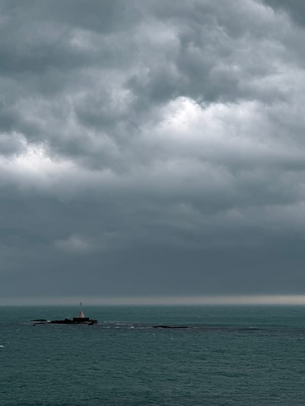 Storm clouds gather over historic coastal Tsarevo, Bulgaria