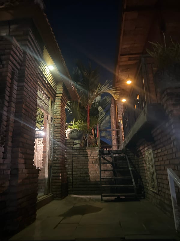 Night at a North Kuta resort, with a street food stop nearby