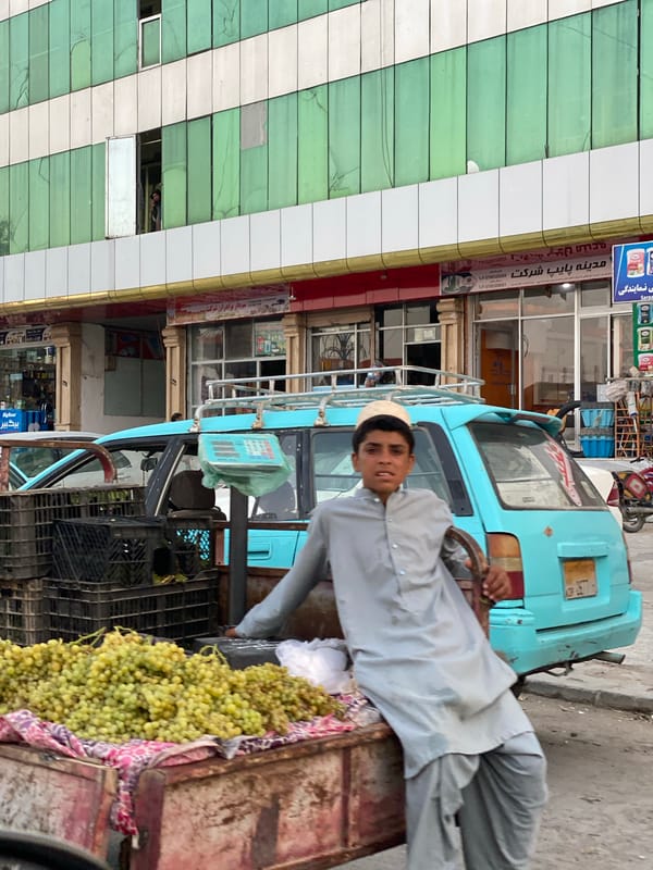 Street life in Kandahar: vendors, pedestrians, and daily movement