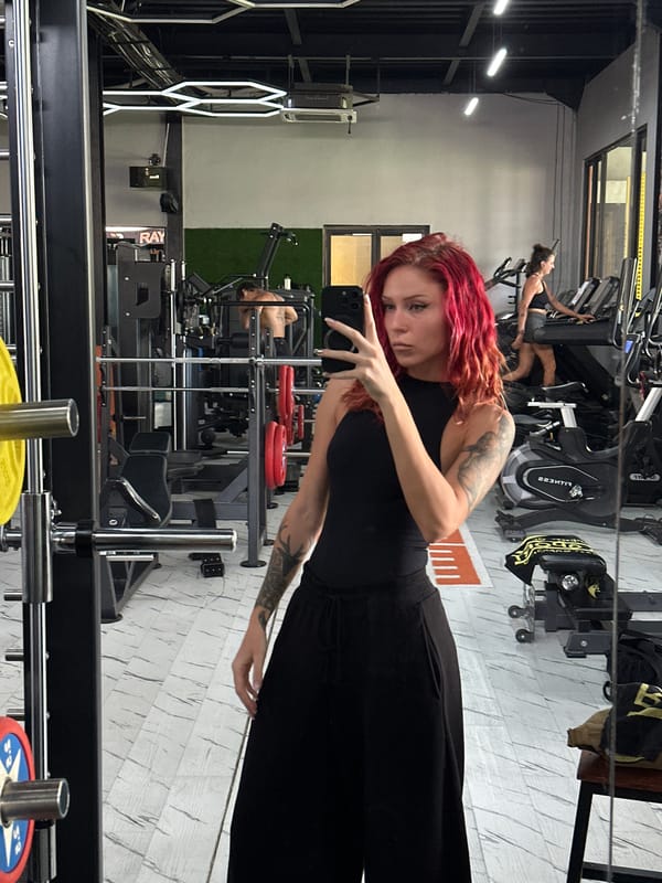 Woman takes gym selfie in North Kuta fitness center