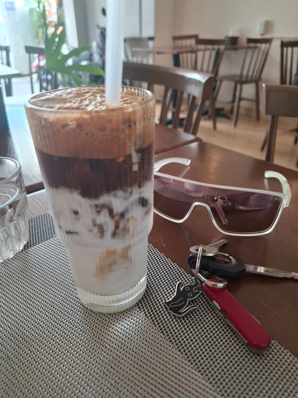 Morning at a charming Nha Trang café, streets and all