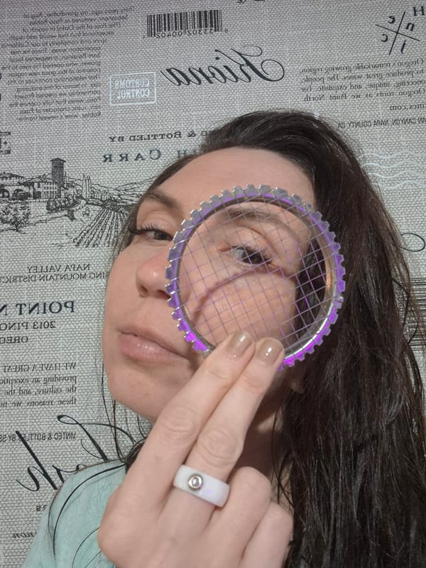 Person experiments with objects covering face in artistic photos