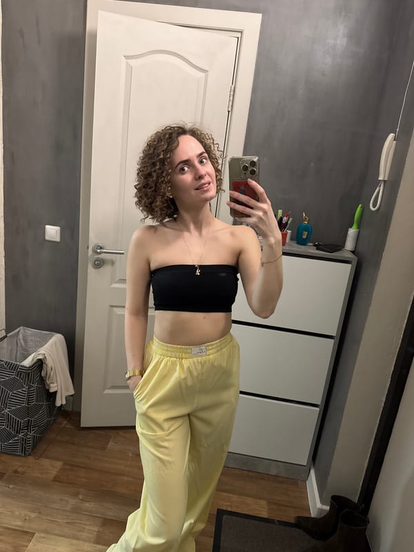 Woman takes selfie indoors in Perm, Russia