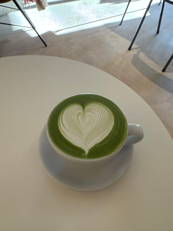 Heart-shaped latte art spotted on matcha drink in Tokyo
