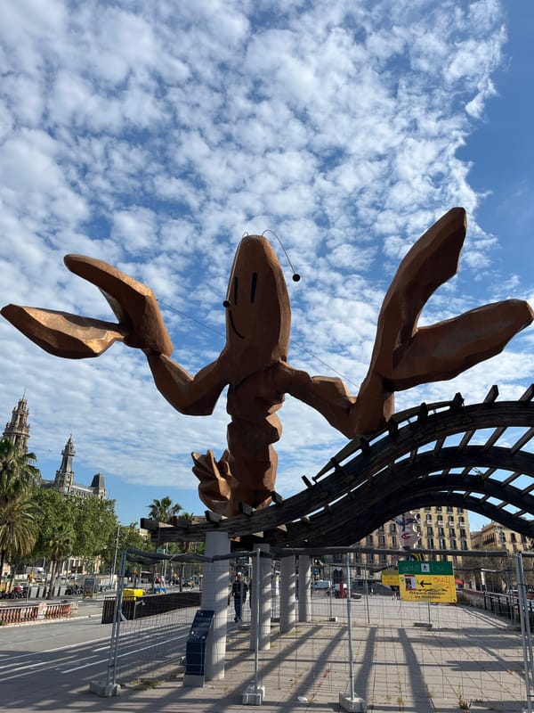 Barcelona street scenes feature lobster sculpture, decorated skateboards