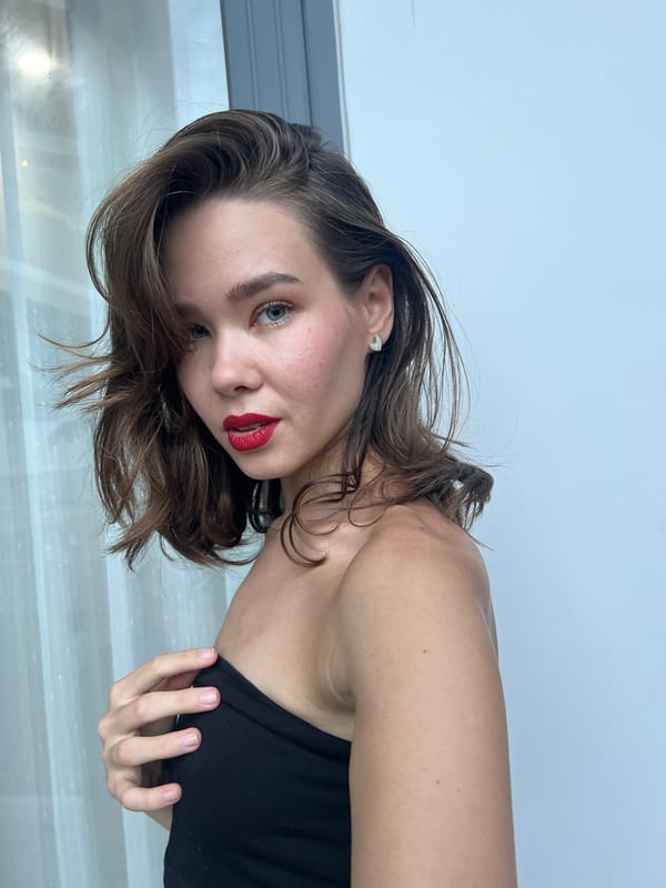 Woman photographed posing indoors in Nam Nha Trang Ward