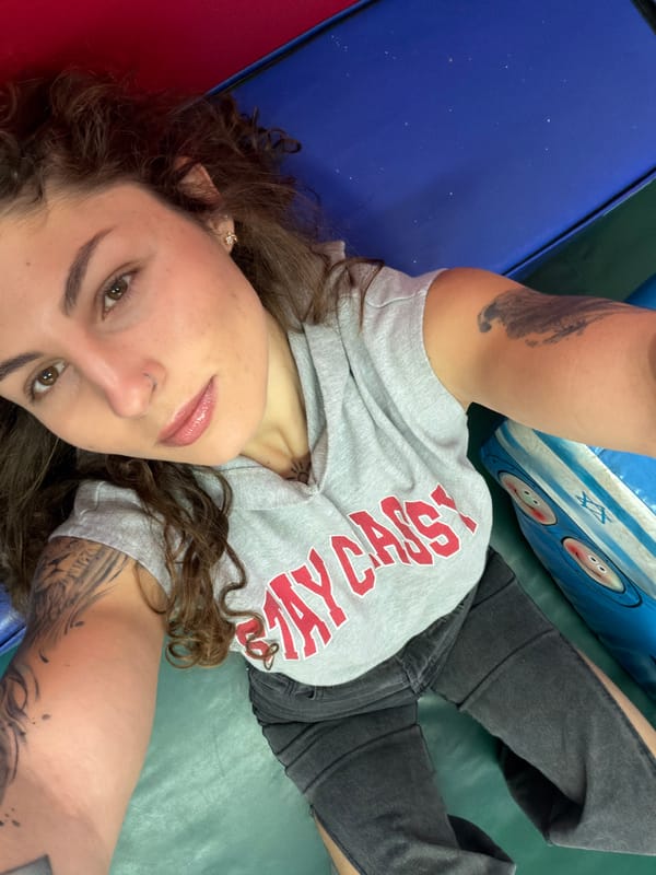 Woman takes selfie while lying down in Kiryat Bialik