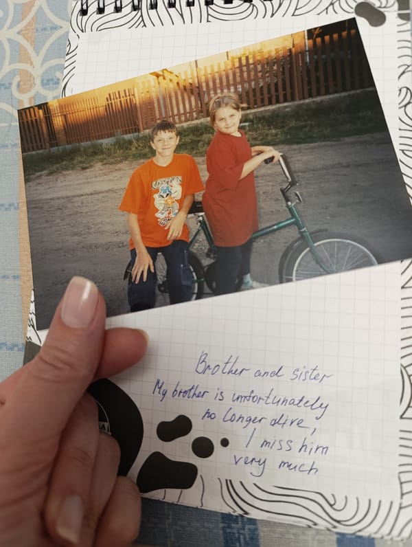 Person documents family photos and memories during evening session
