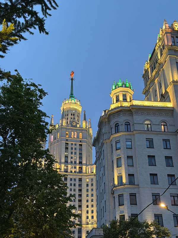 Monumental buildings photographed at twilight in Ukrainian settlement