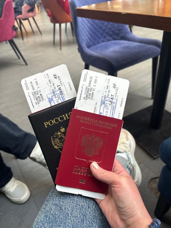 Traveler with dual passports, woman photographed at Bolshoye Savino