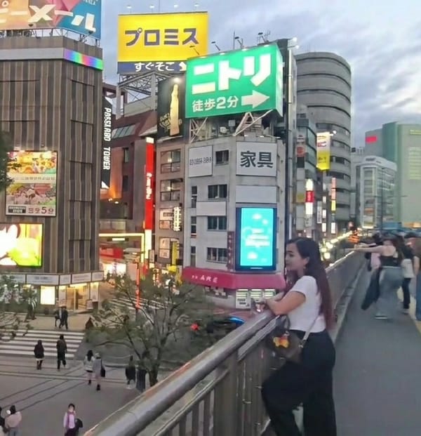 Nighttime street scenes documented in bustling Shinjuku districts