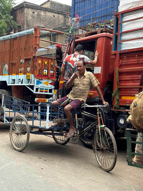 Dawn commercial activity documented across Kolkata streets