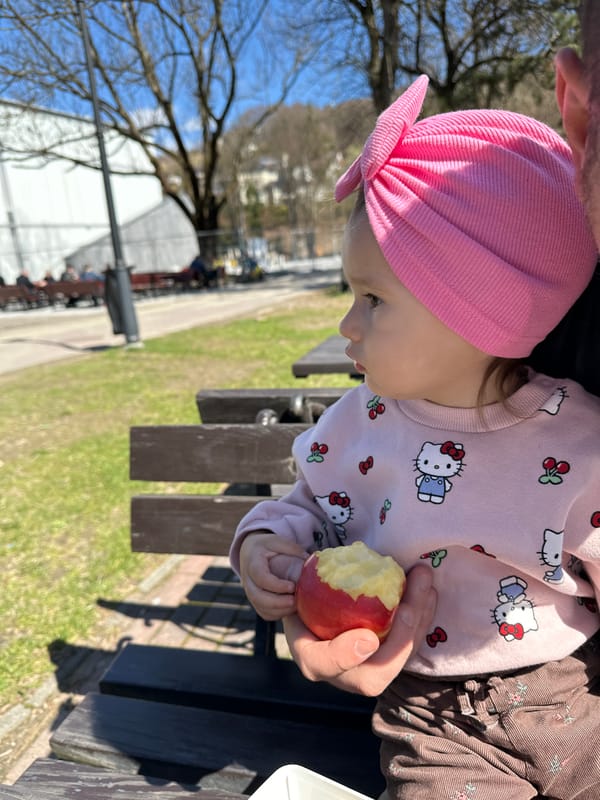 Family enjoys morning outing along Vistula River in Wisła