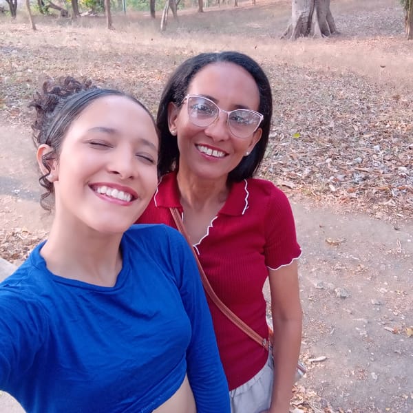 Women document evening park visit in Parroquia Ocumare, Venezuela