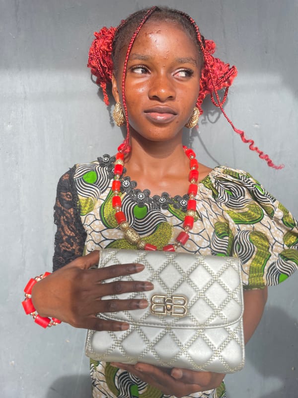 Portrait session documents woman in traditional attire in Badagry