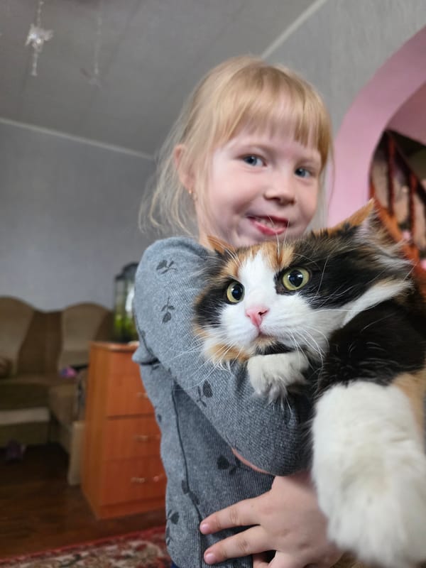 Family moments with pets captured in Chaikovsky home