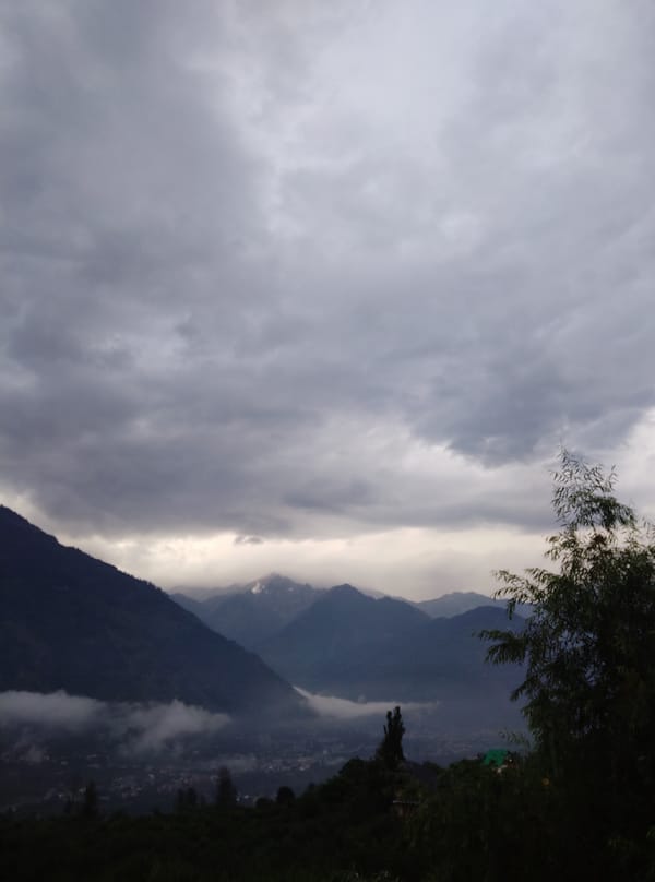 Visitor documents misty mountain morning in Patar, India