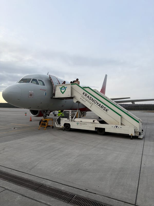 Aircraft with boarding stairs observed at Russian airport