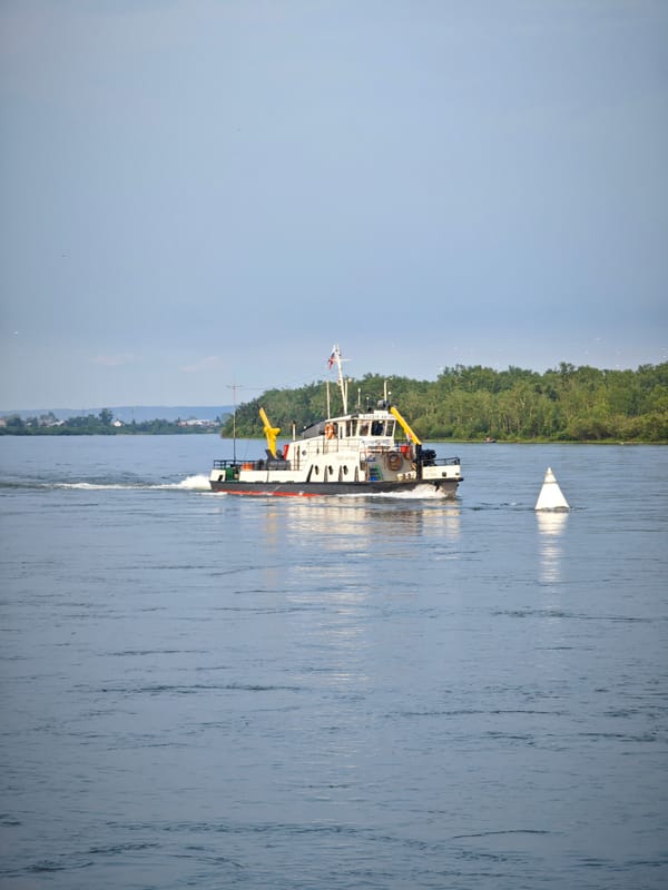 Cargo vessel and shipyard activity on the Yenisei River