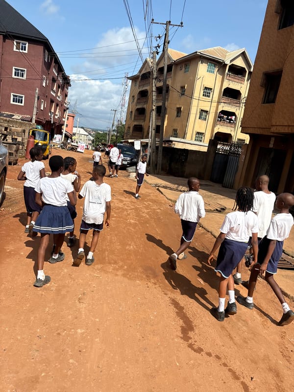 School uniforms, street scenes, and small curiosities across Onitsha and Nkpor