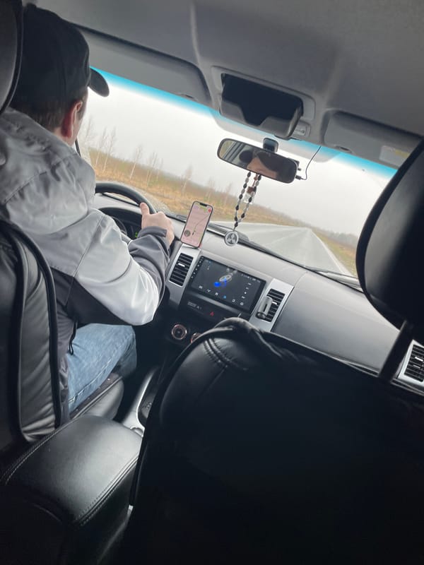 Driver photographed in vehicle interior in Sidorovy Gory, Russia