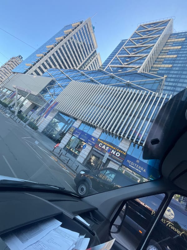 Morning drive through modern city with highways and skyscrapers