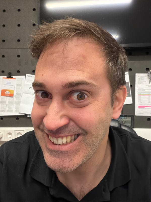 Man photographed smiling at workplace in Pétange, Luxembourg
