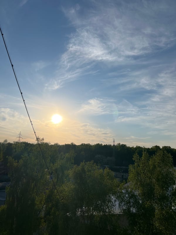 Clear blue skies with wispy clouds observed over Irkutsk