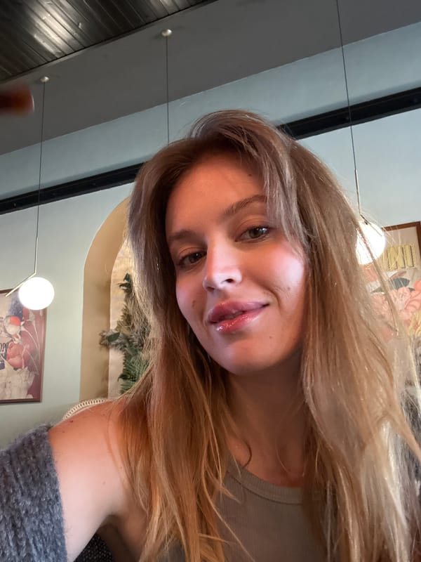 Woman takes restaurant selfie in Rome