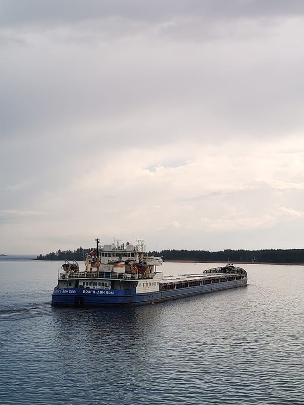 Cargo barge Volgo-Don 5061 loads gravel at Shalsky port