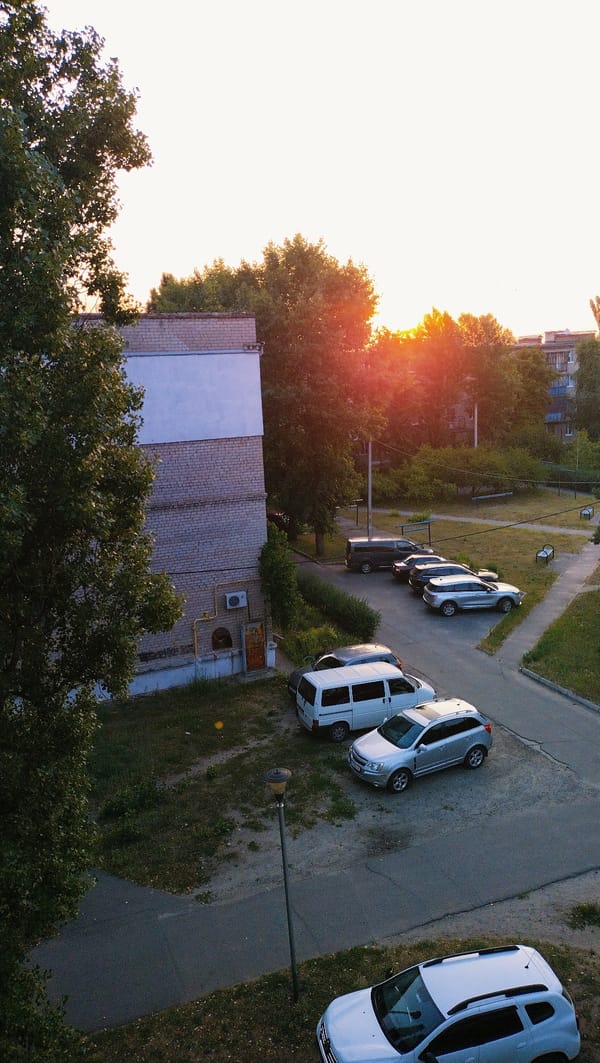 Rottweiler, sunset courtyards, and a Ganesha figurine in Horishni Plavni