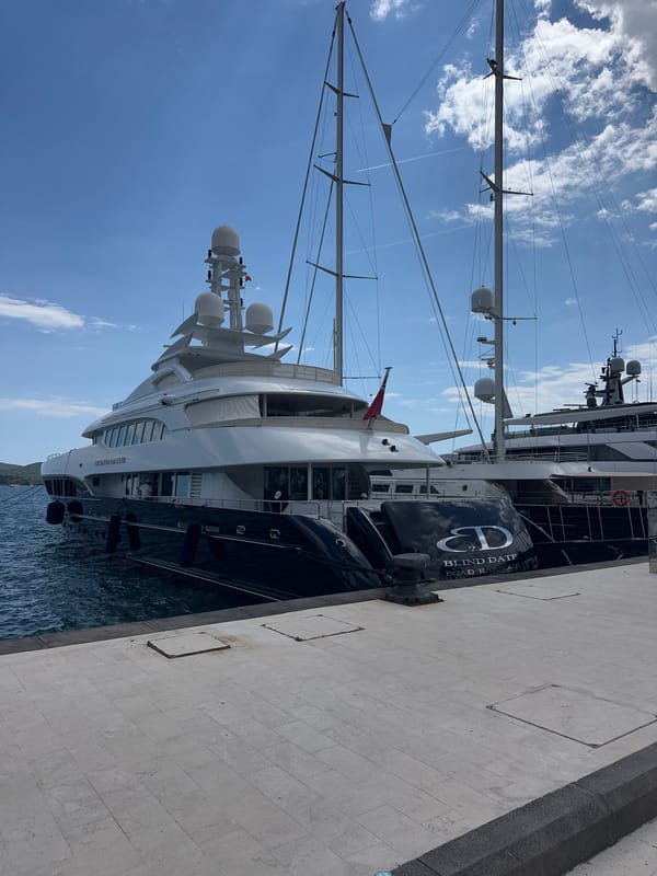 Porto Montenegro's marina promenade on a summer afternoon