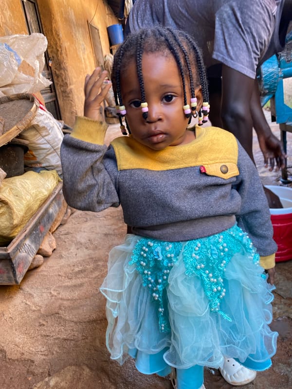 Candid courtyard moments in Jos, Nigeria