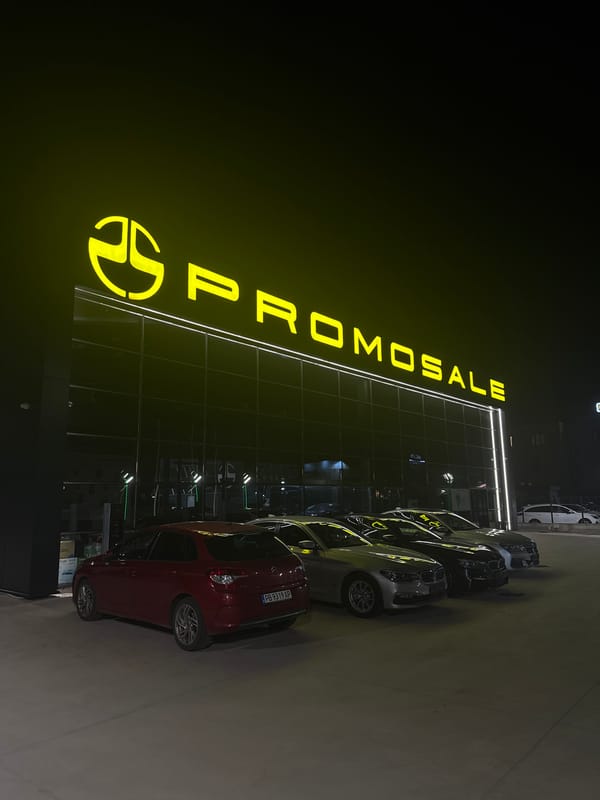Car dealership operates under night lights in Plovdiv
