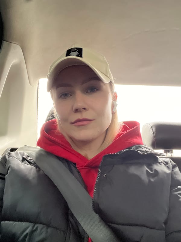 Woman takes selfie in vehicle in Moscow