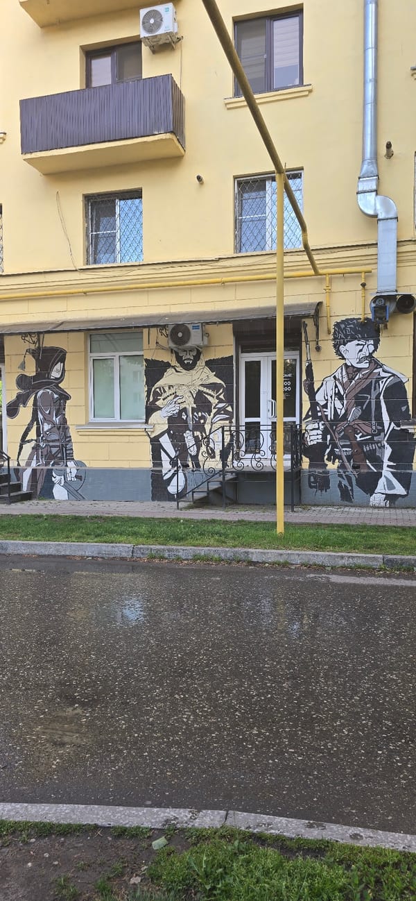 Yellow building with Chechen murals observed in Grozny