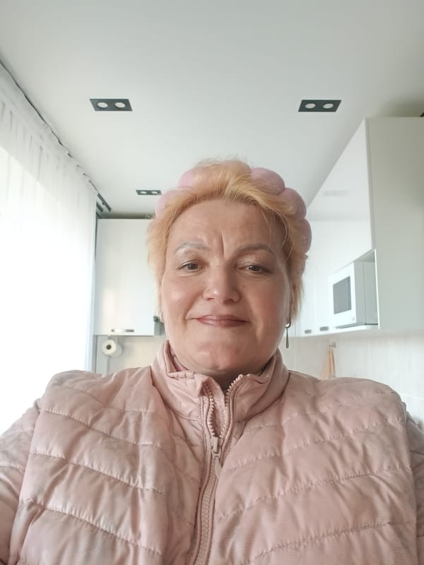 Elderly woman takes selfies at home in Murom, Russia