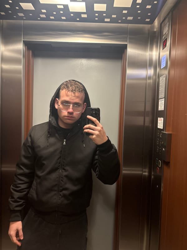Young adult takes selfies in Plovdiv elevator