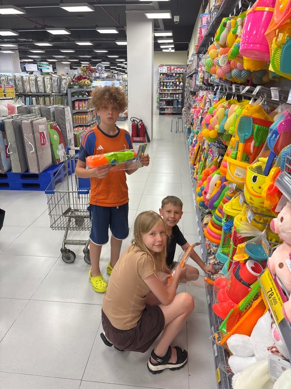 Kids pick out toys at a Phan Thiết hypermarket