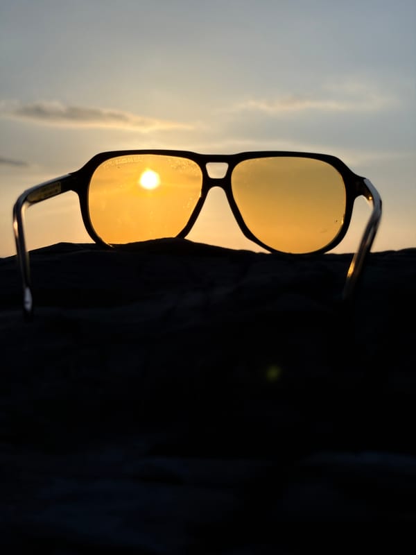 Sunglasses meet sunset on Ko Samui's calm coastline