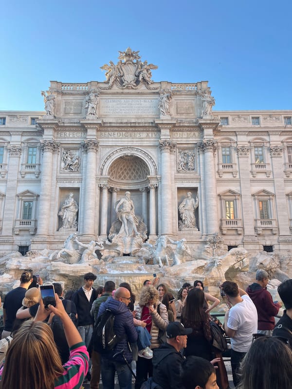 Crowds gather at Rome's iconic Trevi Fountain