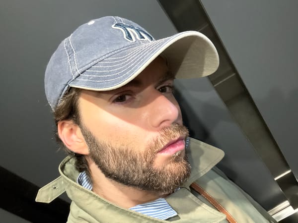 Man in Yankees cap photographed making faces in Montreal
