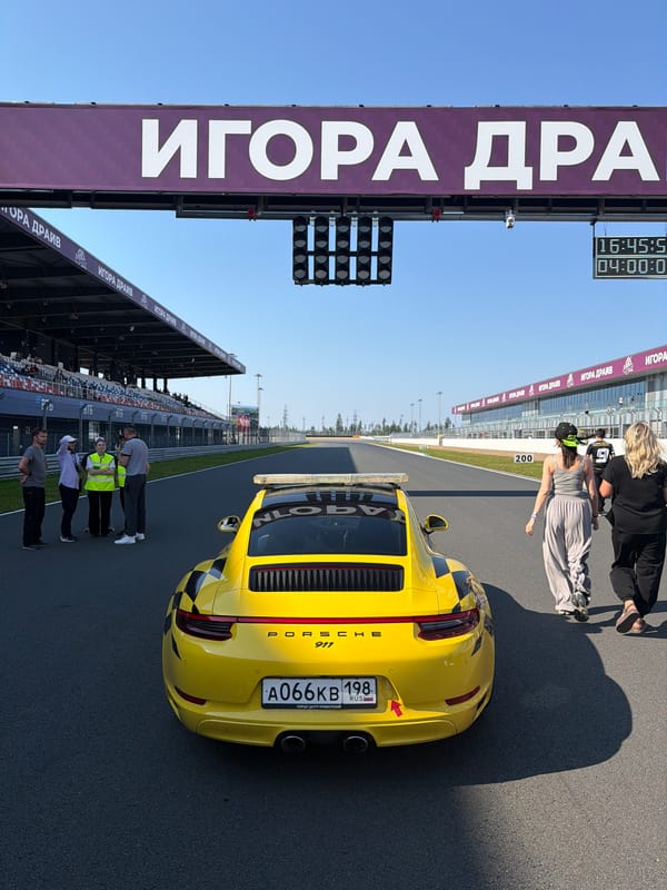 Race cars lined up at a motorsport event